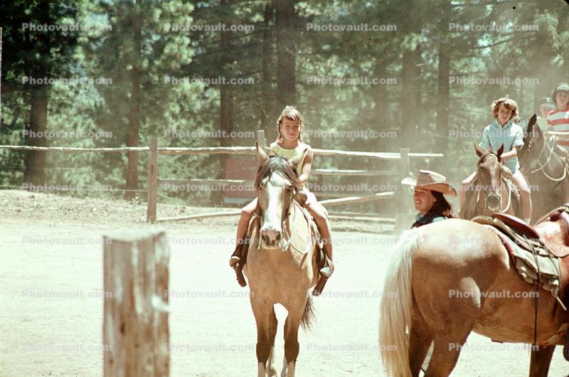 Girls riding horses, California, 1950s