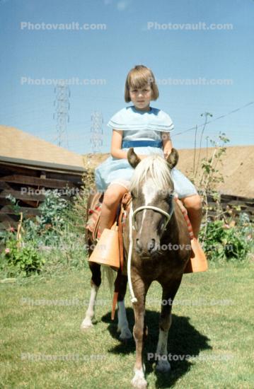 Girl on a Horse, baclyard, female, 1950s