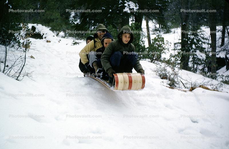 Family on a Sled in the Snow, Ice, Cold, Smiles, fun, jackets, 1950s