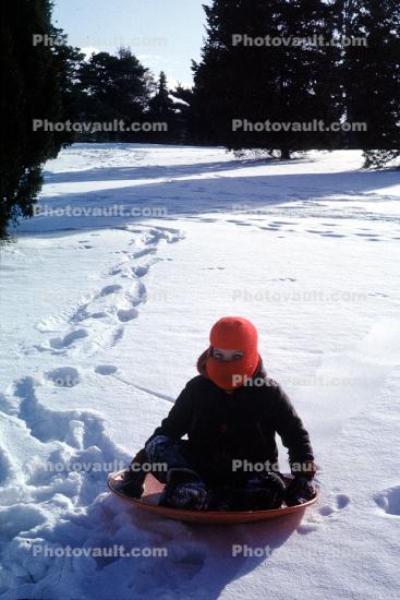 Boy Sledding Downhill in the Snow, Winter, Coats, 1950s