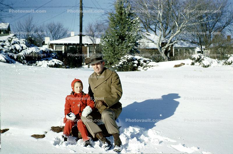Father and Daughter Sitting in the Snow, 1950s