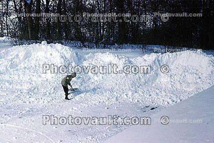 Boy Shoveling Cold Snow, jacket, 1960s