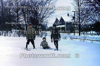 Boy Standing in Snowshoes, Cold Snow, smiles, jacket, mittens, 1960s