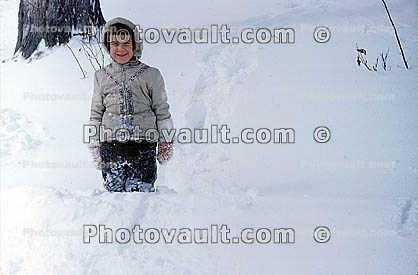 Boy Standing in the Cold Snow, smiles, jacket, mittens, 1960s