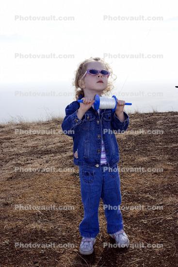 Little Girl flying a Kite