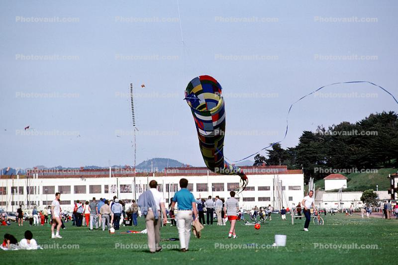 Spiral Tube Kite, crowds, building, People Flying a Kite