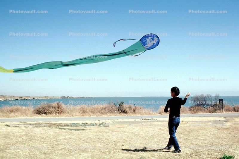 Woman Flying a Kite