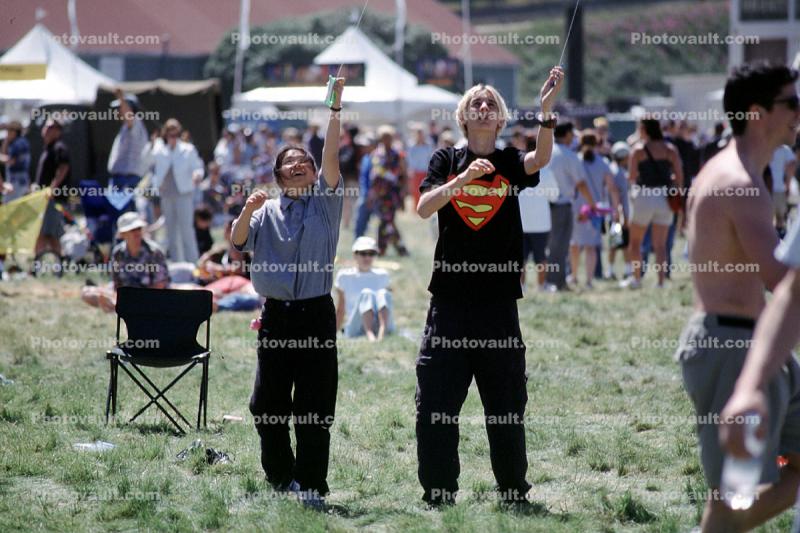 Teen Boy and Girl flying a Kite, Opening Day, Crissy Field, Celebration, 6th May 2001
