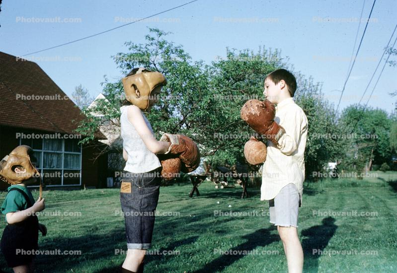 boys practicing boxing, gloves, backyard, cute, 1940s