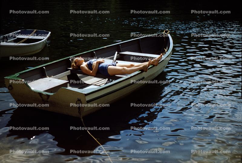 Woman Sleeping in a Rowboat, Legs, Boat