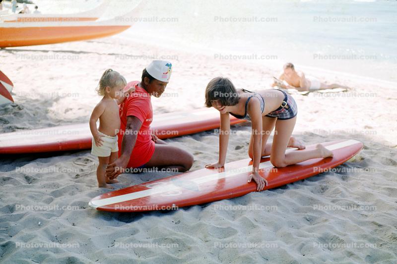 Teen Girl Surf Lessons, Waikiki Beach, surfboard