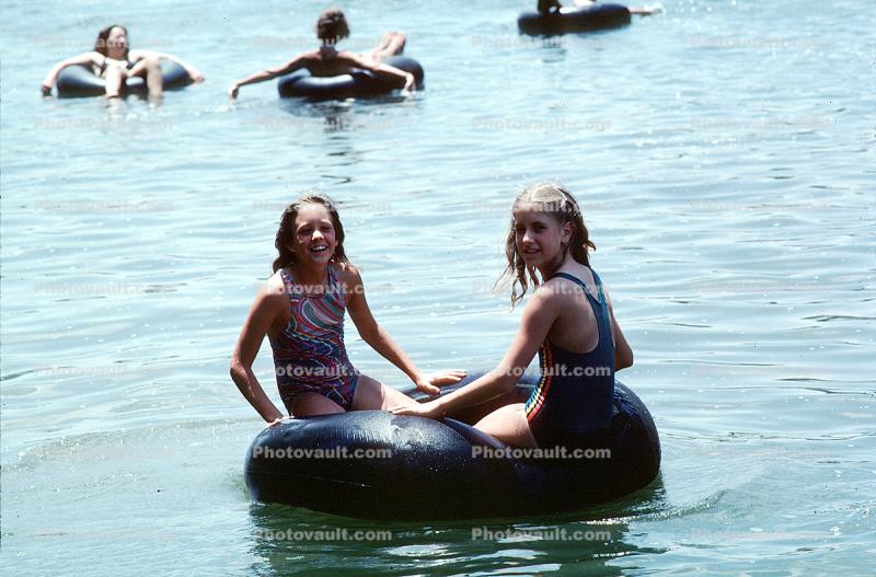 Girls Floating on an Inner Tube