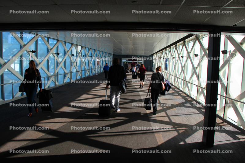 Bridge Walkway, passengers, shadow