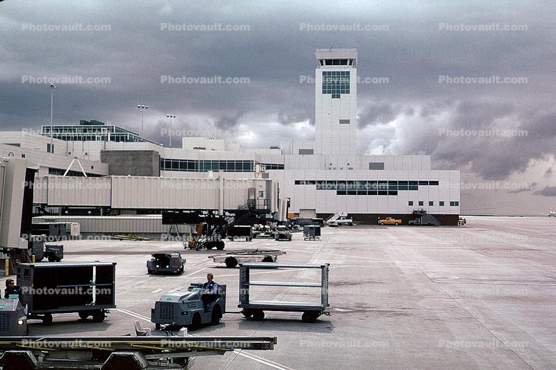 Control Tower at Denver International Airport, ground personal, carts, baggage tractors, May 1995