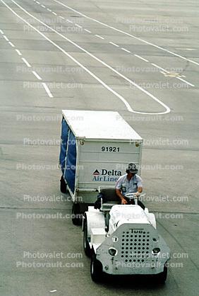 ground personal, carts, baggage tractors