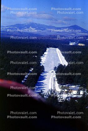 Runway in the Snow, Forest, Mountains