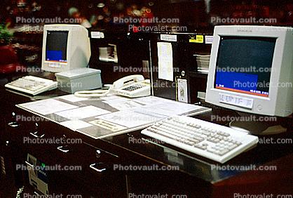 Check-in, computers, phone, telephone, monitors, keyboards, 1980s