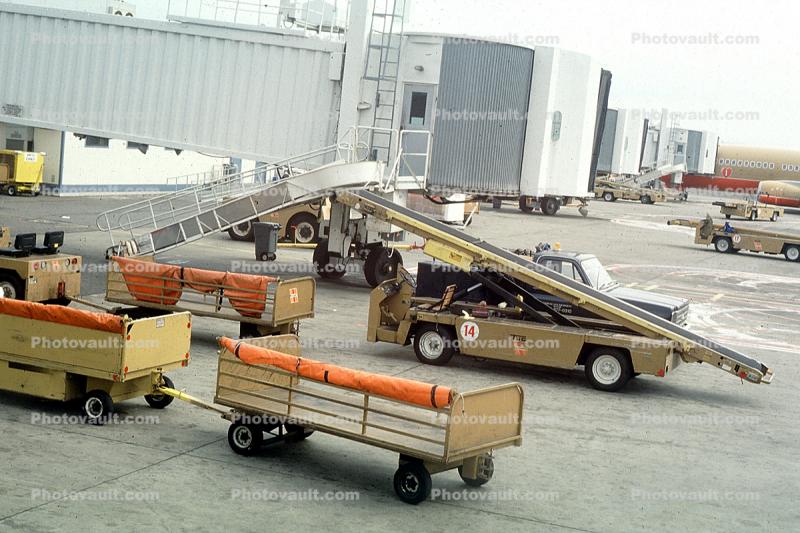 baggage cart, belt loader, jetway, Airbridge