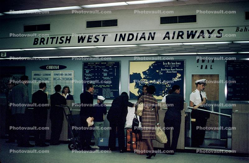 Ticket Counter, British West Indian Airways, Baggage check in, passengers, December 1960, 1960s