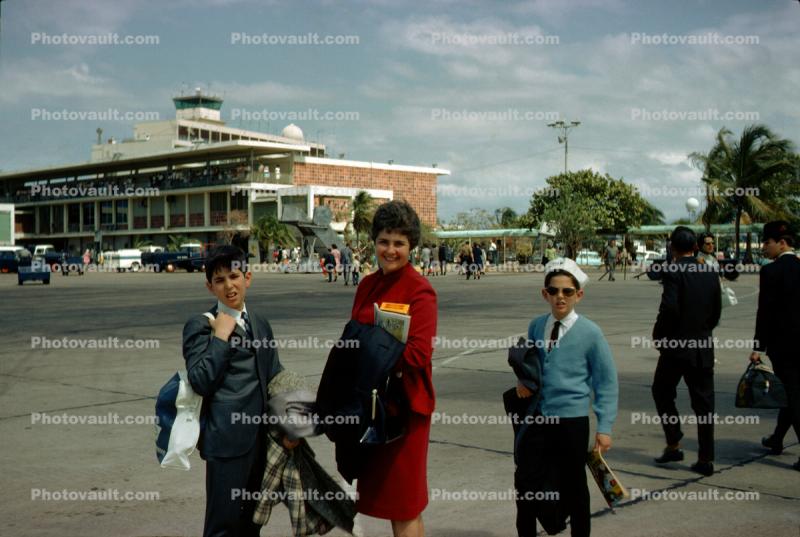 Mother and her Sons, boys, Terminal Building, boarding, April 1965, 1960s