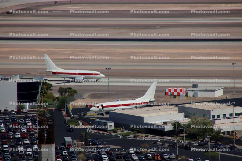 N869HH, Janet Airlines, Terminal Buildings, cars, Boeing 737-600.