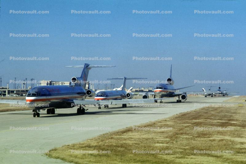 Jets lined up for take-off, American Airlines AAL, Boeing 727, Douglas DC-10, December 2, 1986