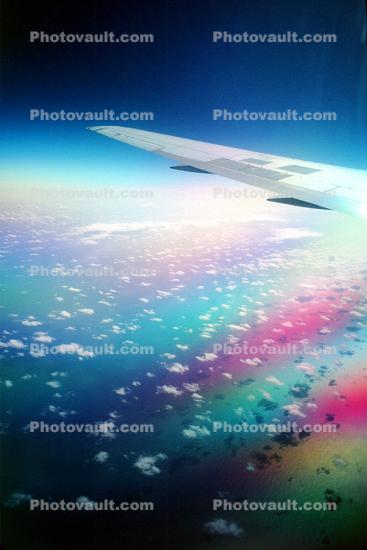 Wing in Flight, Clouds, California