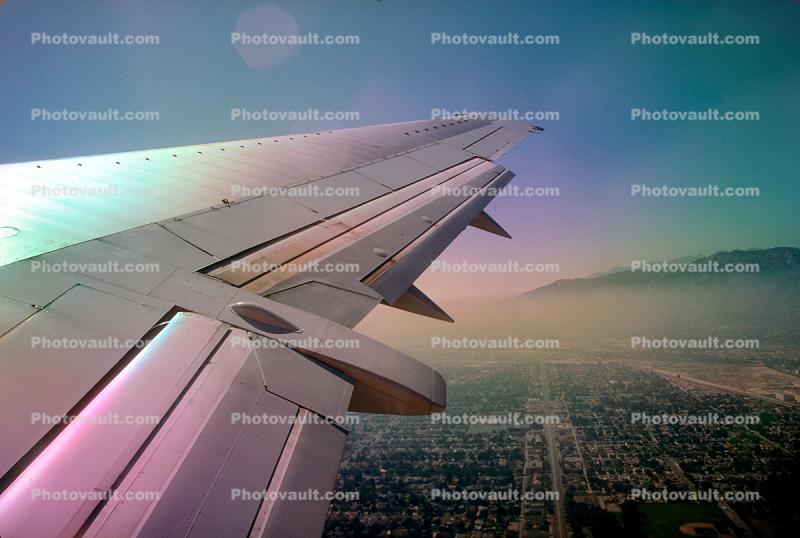 Colorful Lone Wing in Flight, Boeing 737, Smog over San Fernando Valley