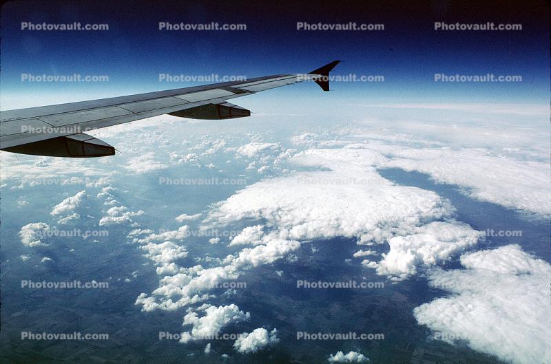 Airbus A320 Wing in Flight, Airborne, Clouds
