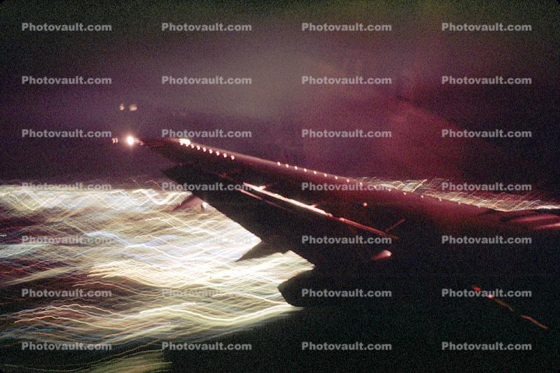 Lone Wing in Flight, Night, Exterior, Outdoors, Outside, Nighttime