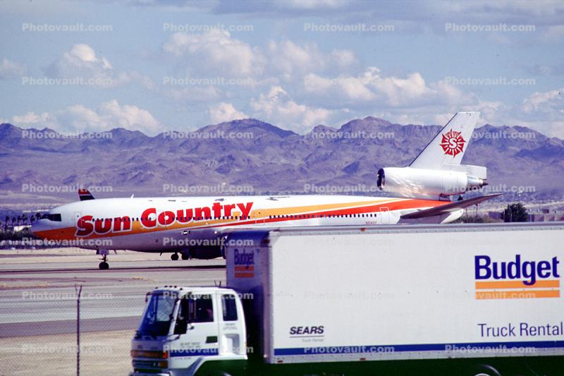 N154SY, Sun Country Airlines, Douglas DC-10-15, Budget Truck Rental, Ground Equipment