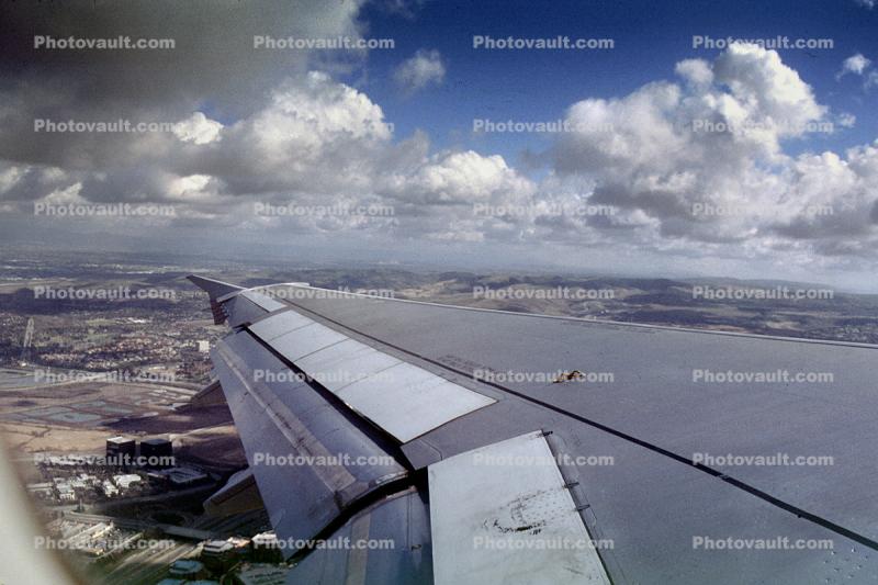 Flaps, Airbus A320, Lone Wing in Flight, clouds, puffy, flying, airborne