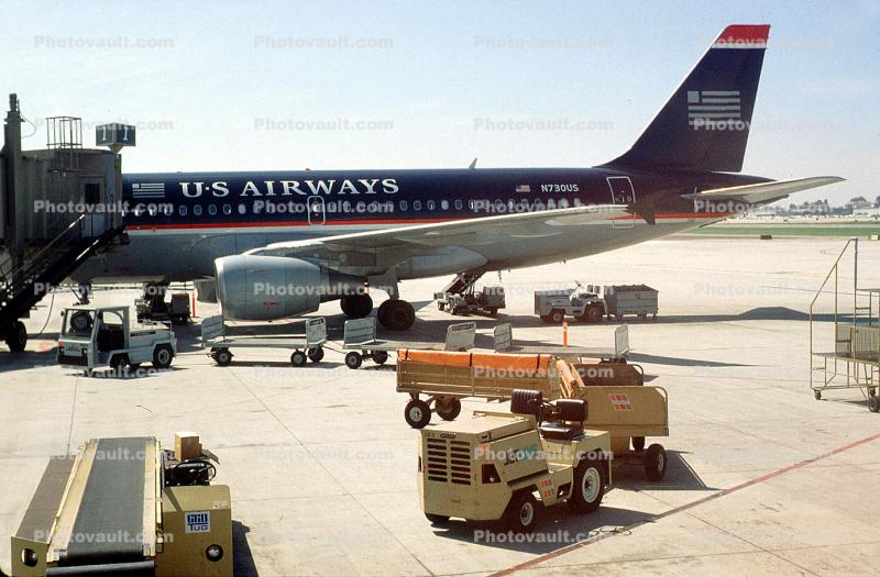 US Airways, N730US, Airbus A319-112, US Airways AWE, A319 series, CFM56-5B6/P, CFM56, Santa Ana International Airport, Belt Loader, tow tractor, carts