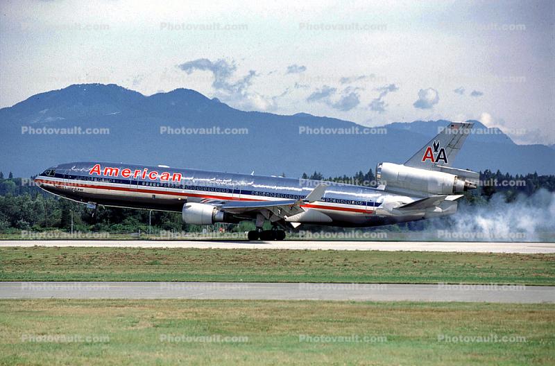 N1765B, Landing with Smoke Billowing from the Tires, American Airlines AAL, McDonnell Douglas, MD-11, CF6-80C2D1F, CF6