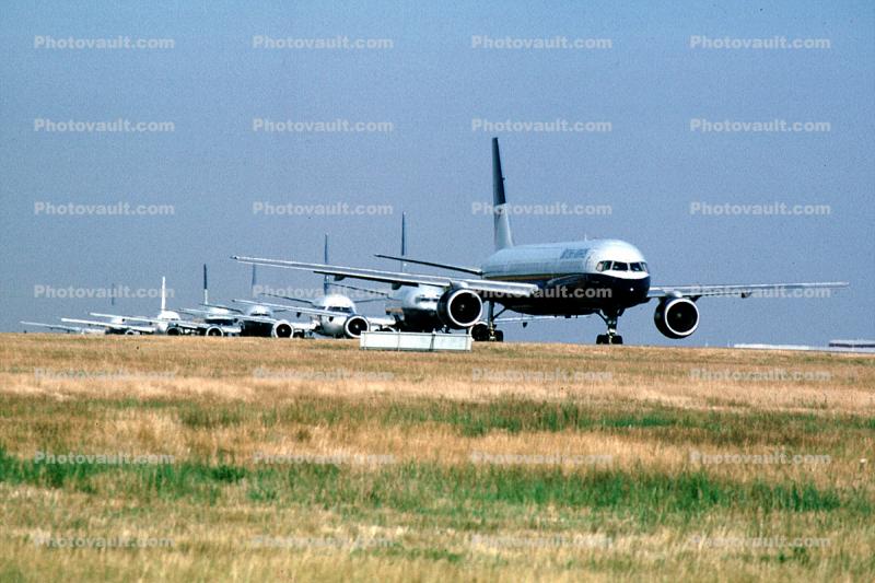Row of aircraft waiting to take-off, Jets lined up for take-off