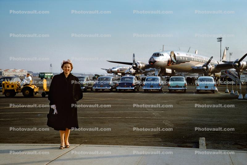 Woman Standing at the Airport, cars, N6227C, L-1049, EAL, 1955, 1950s