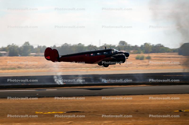 Beech-18 Flyong Over the Runway at MHR