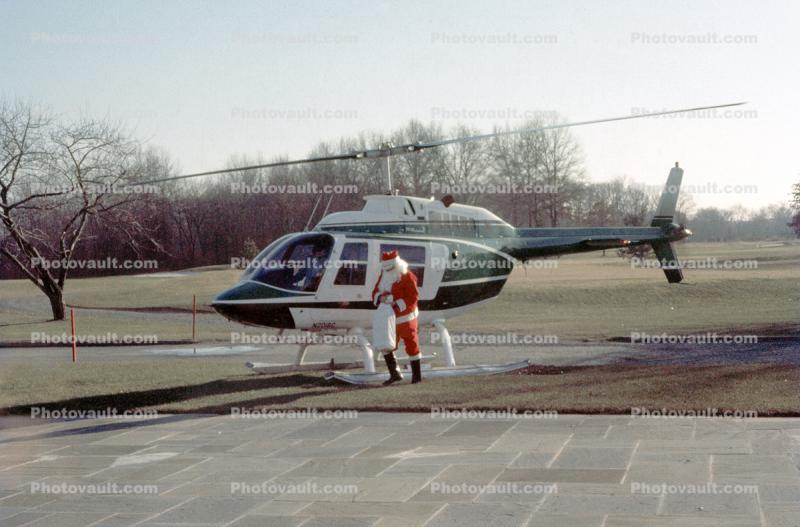 N201SC, Santa Claus witha Bag of Gifts, Bell 206 JetRanger
