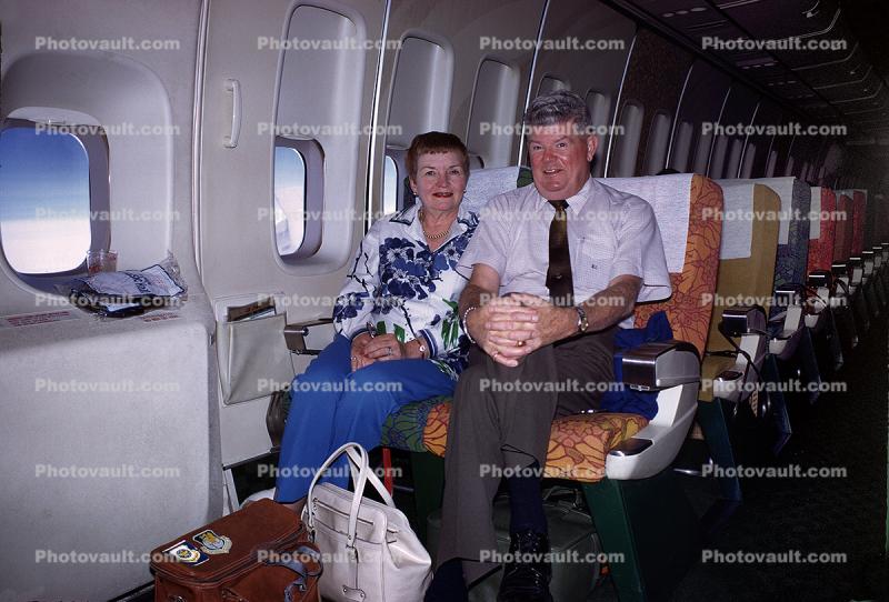 Passengers, Bags, Man, Woman, seats, Boeing 747, August 1974, 1970s