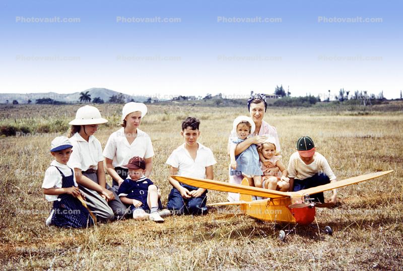 Children with Balsa Wood airplane, Mothers, Son, Daughter, 1950s