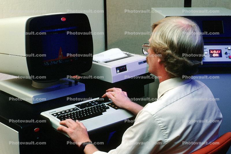 Man at Computer, Hand on Keyboard, 1980s