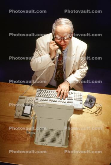 Man at Desktop Computer, male, keyboard, phone, 1995, 1990's