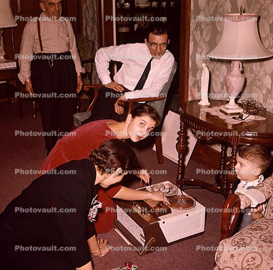 Tape Recorder, lamp, tablewomen, man, 1950s