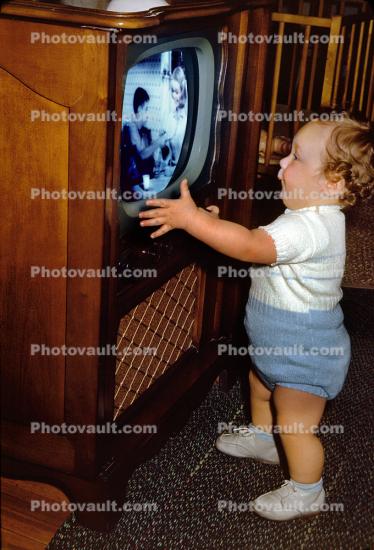 Little Boy Staring into the Television, 1950s