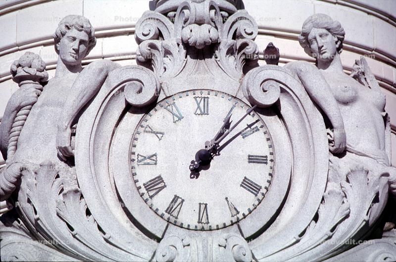 Clock, outside, exterior, building, bas-relief sculpture, man, woman, roman numerals
