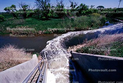 Effluent, Clean Treated Wastewater being released into a river, Rapid City, South Dakota
