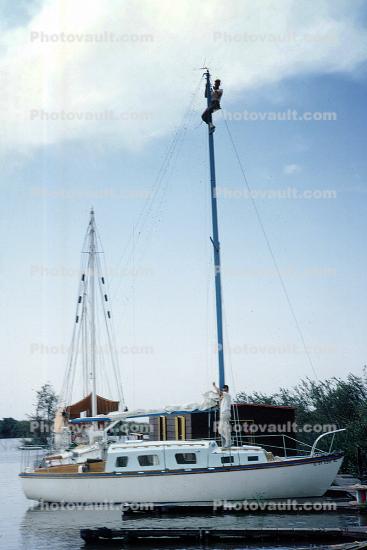 Boat, dock, Man climbing a mast, repair, MRO, 1960s