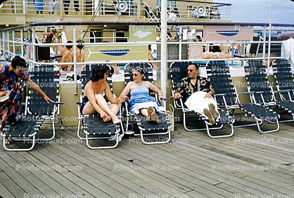 Women, Man, Lounge Chairs, wooden deck, Matsonia Steamship, Matsonia, Cruise Ship, 1963, IMO: 5229223, 1960s