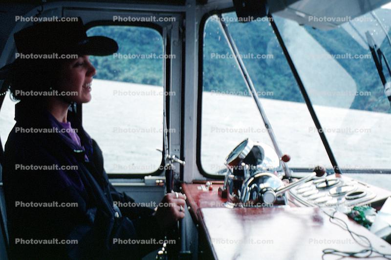 Cowgirl at the helm