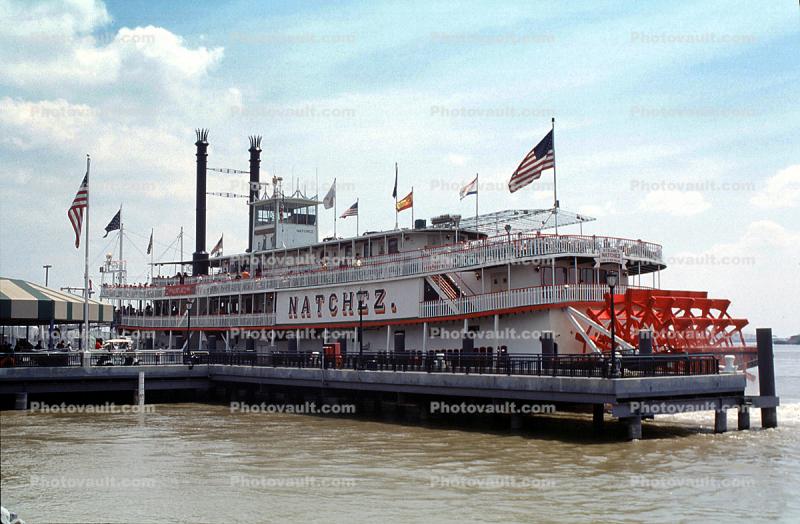 riverboat S.S. Natchez, Sternwheeler, Docks, flags